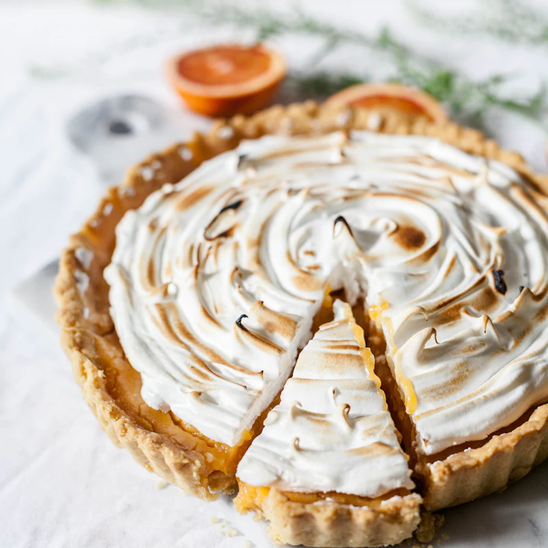 Citron Brûlé — lemon tart with torched meringue swirls