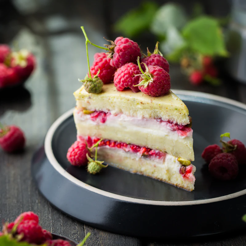Framboise-Pistache — pistachio sponge cake topped with fresh raspberries